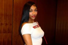 Angel Reese shows off what "God gave her" leaving the cameraman breathless